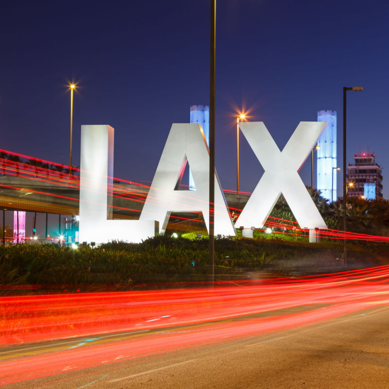 An Illuminated Sign Welcomes Passengers To Los Angeles Airport