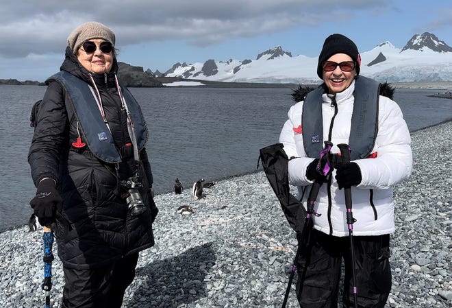 Best Friends Ellie Hamby And Sandy Hazelip Pose With Penguins In Antarctica In January 2023.