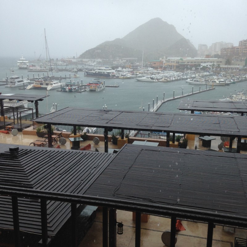 Stormy Day In Cabo Overlooking The Marina With A View Of The Boats While It'S Raining.