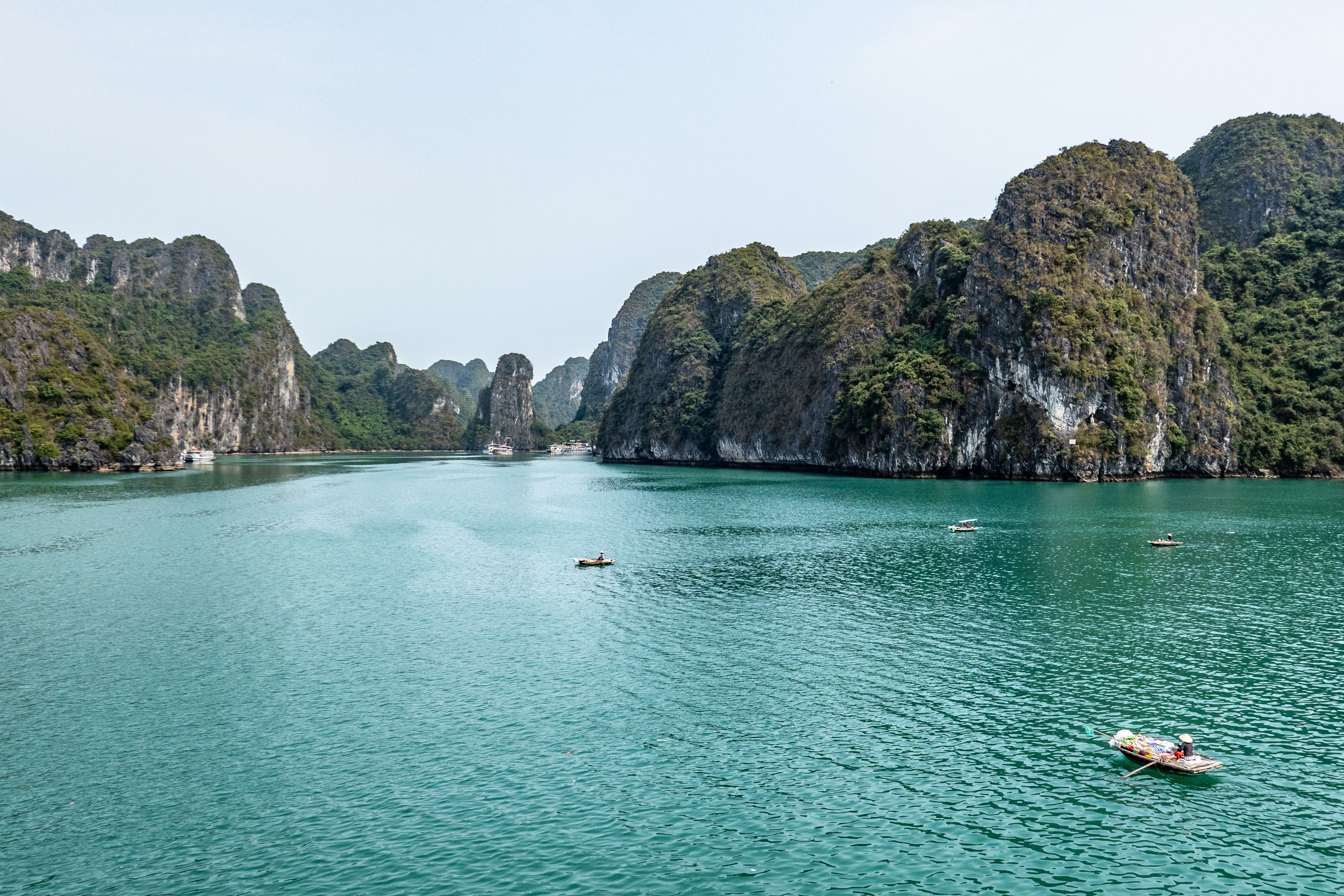 A Boat Floating On The Water In Ha Long Bay