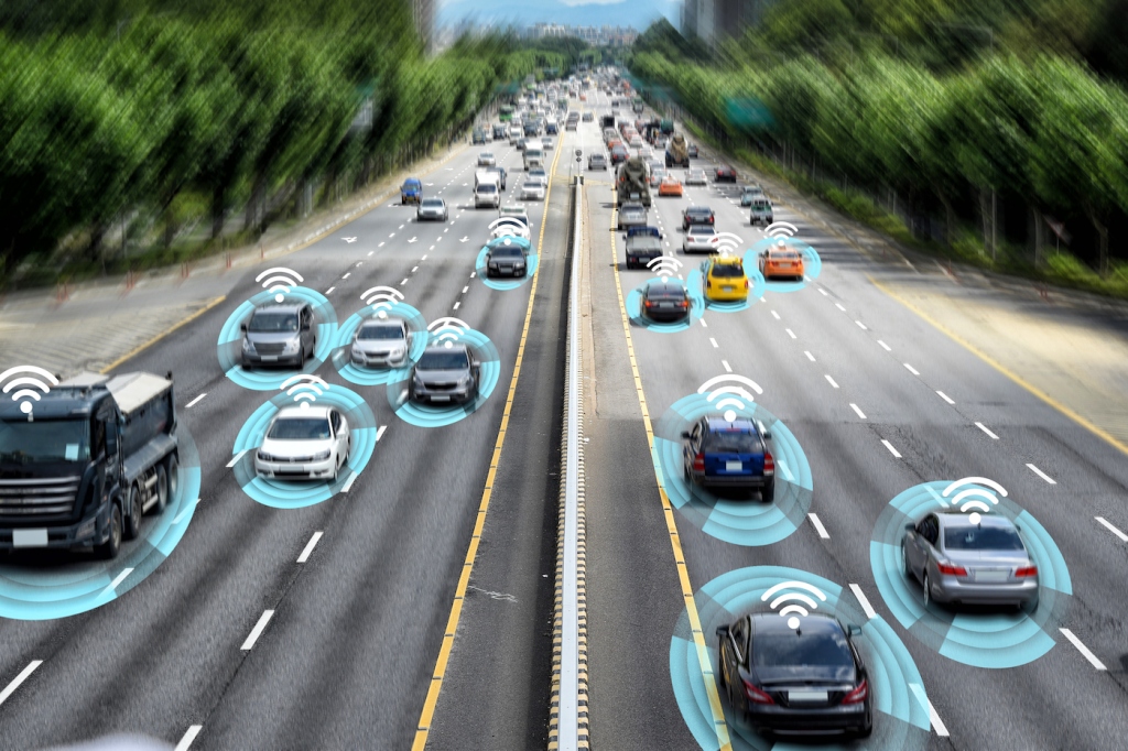 Smart Car (Hud), Autonomous Vehicle In Autonomous Driving Mode On Metropolitan Road Iot Concept With Graphic Sensor Radar Signal System And Internet Sensor Connection.