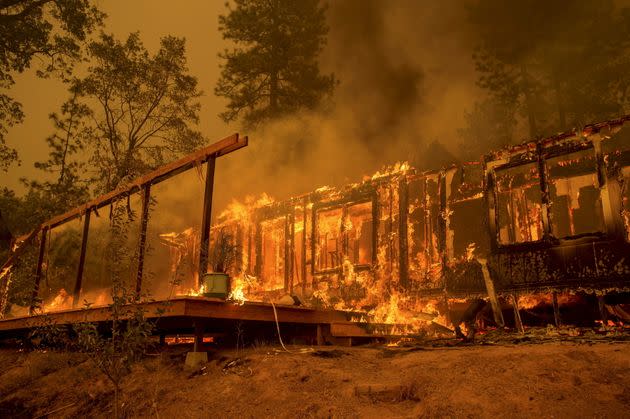 A House Burns As The Butte Fire Rages Near Mountain Ranch, California In 2015.